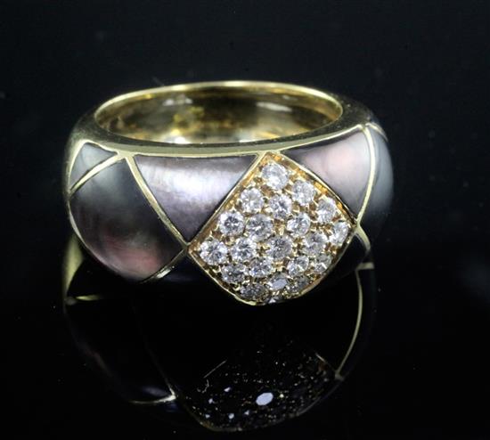 A modern gold, diamond and paua shell? set dress ring, size O.